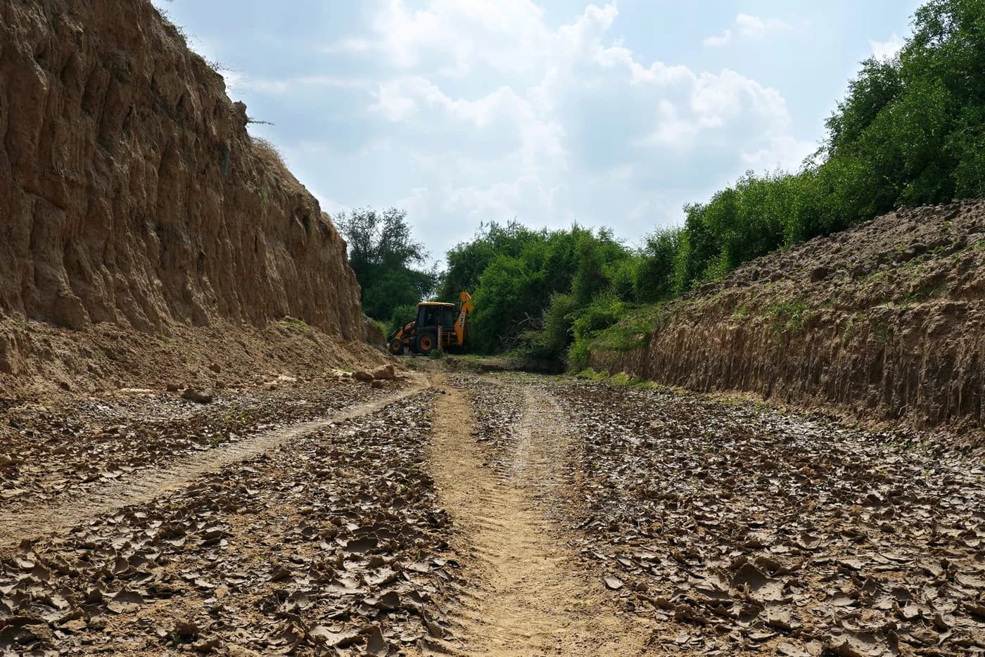 Excavator working on a soil remediation and excavation site